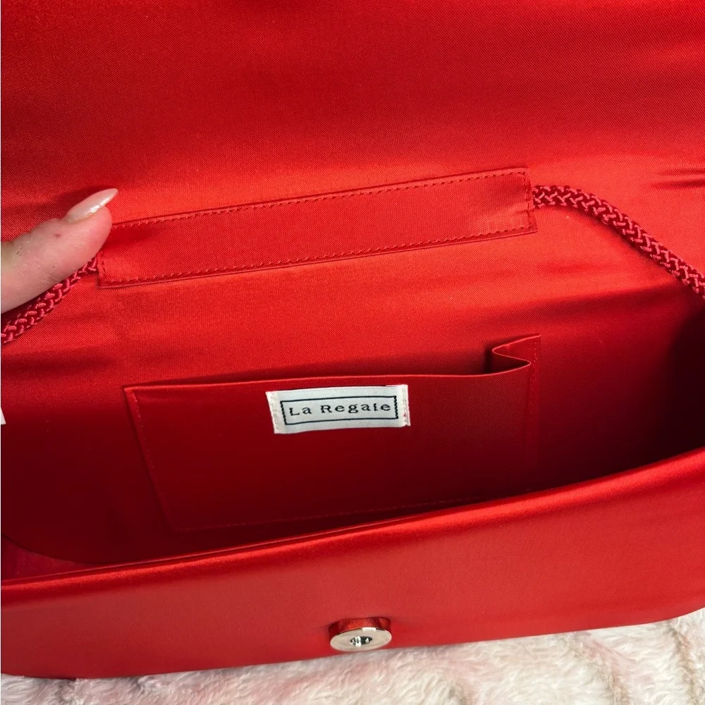 La Regale Red Textured Clutch
